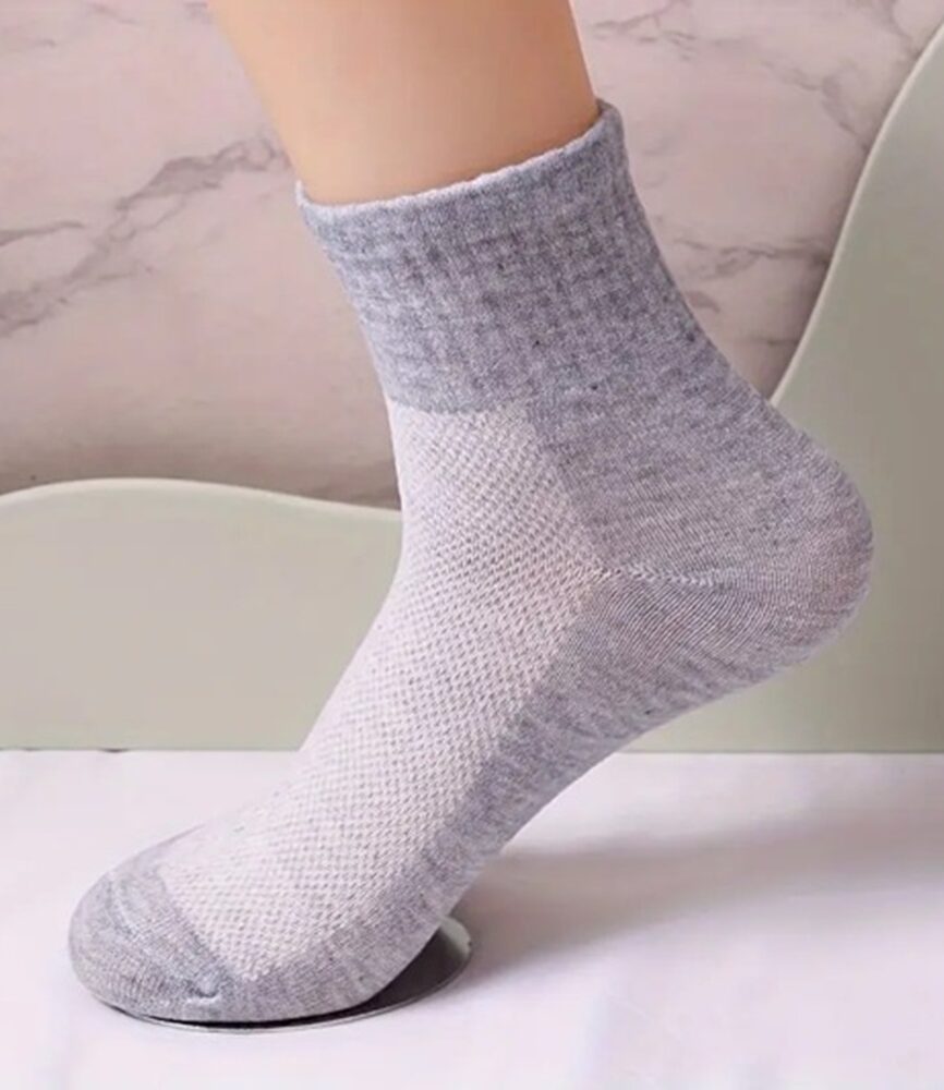Solid Black Ribbed Athletic Sock on Foot