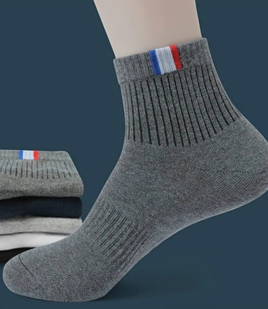 White Ribbed Ankle Sock with Tricolor Tab on Foot