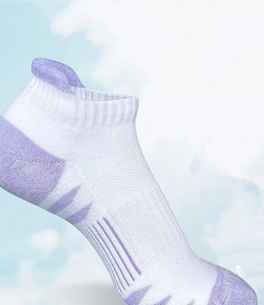 Pink and Green Cushioned Heel Tab Sports Socks on Feet