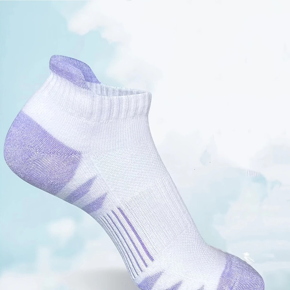 Pink and Green Cushioned Heel Tab Sports Socks on Feet