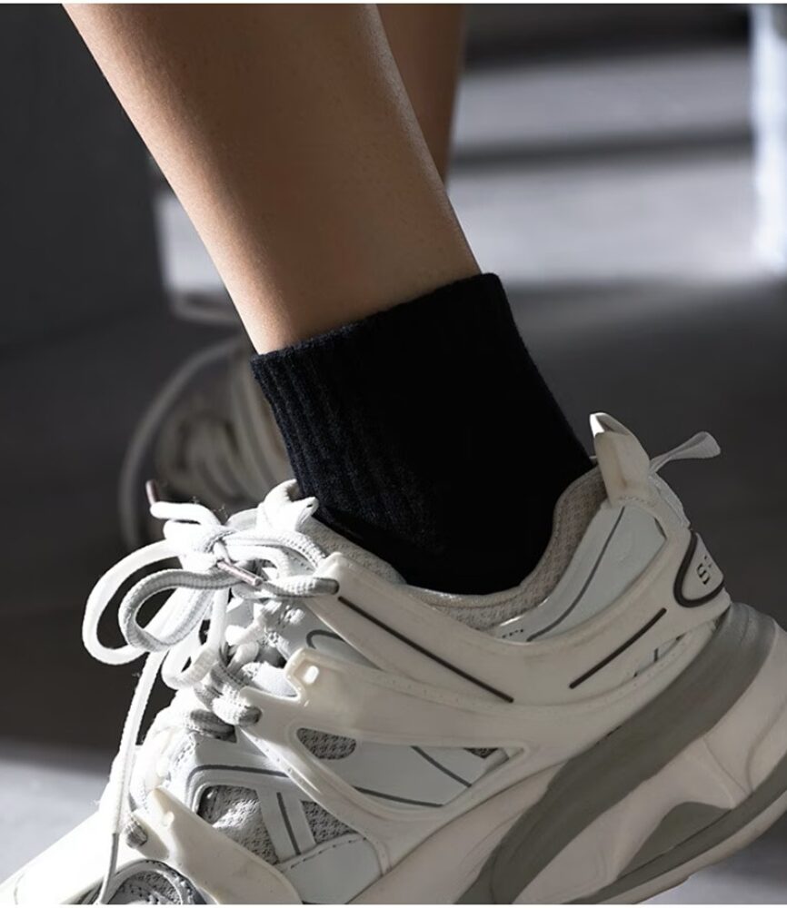 Black Ribbed Quarter Sock on Foot with Sneaker
