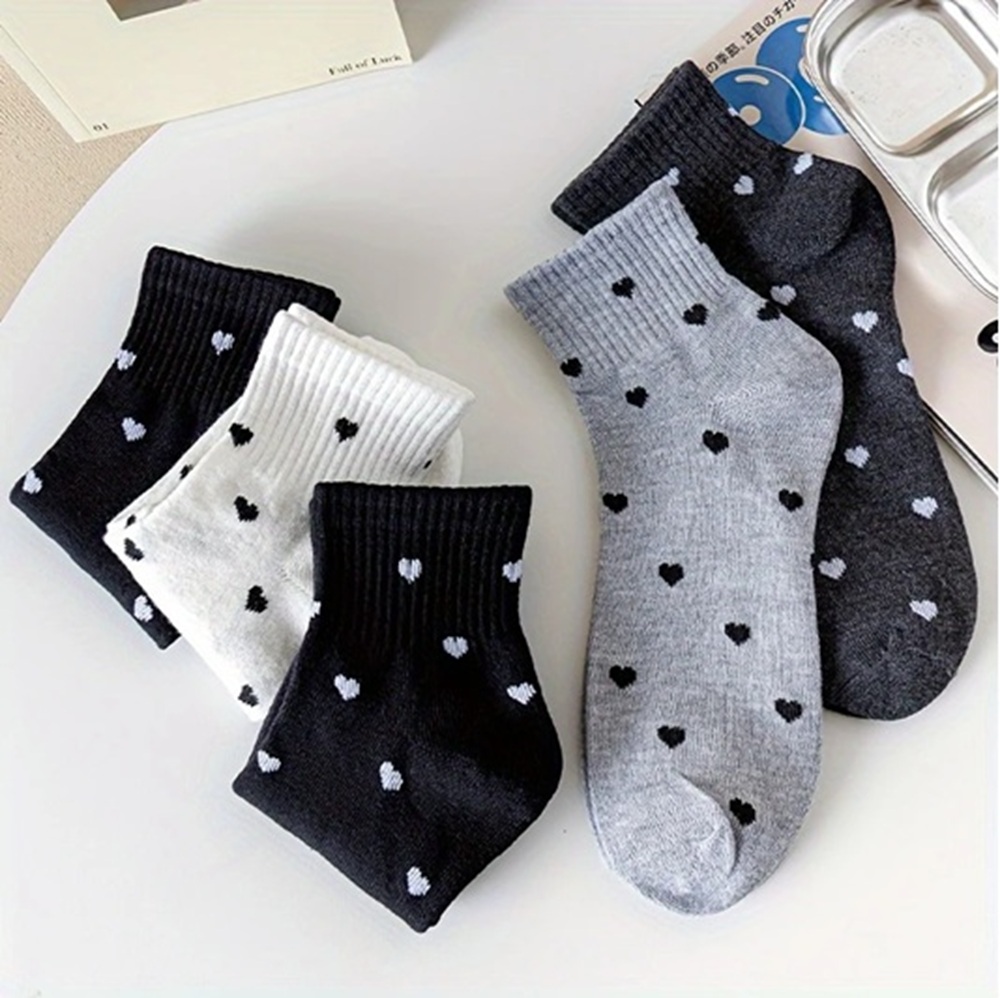 White and Black Mini Heart Socks on Feet