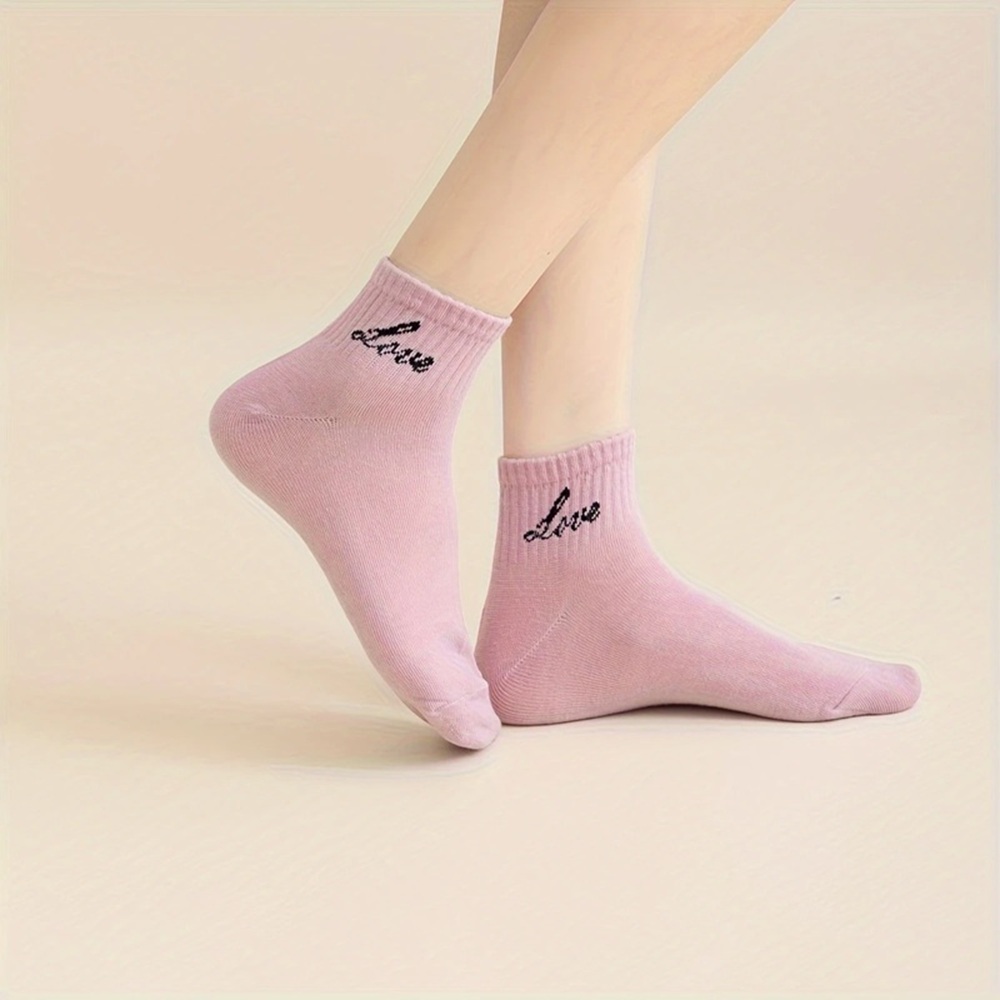 Dusty Pink and Sky Blue 'Love' Socks on Feet