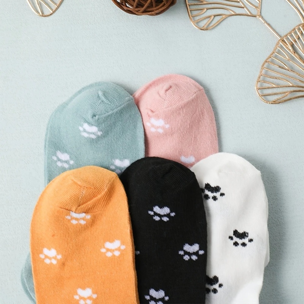White and Black Paw Print Low-Cut Socks on Feet